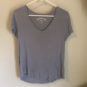 blue v neck shirt